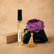 Recarga de aroma textil Bosque Vivo de 10 ml junto a una pieza floral SimLi y caja kraft