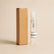 Fragancia textil Marrakech de 5 ml de SimLi junto a su caja kraft sobre fondo beige.