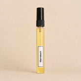 Frasco de recarga de aroma textil Marrakech de 10 ml con líquido visible y etiqueta blanca