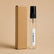 Recarga de aroma textil Sueño Blanco de 10 ml de SimLi junto a su caja kraft 